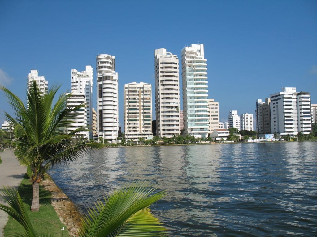 Tall white condos on the edge of the water in Cartagena