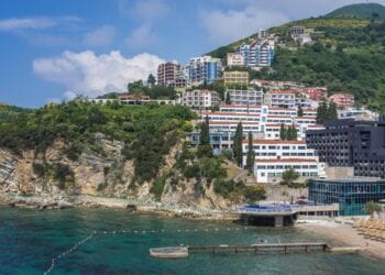 Beach of Avala Hotel near the Old Town of Budva city on the Adriatic Sea coast in Montenegro.