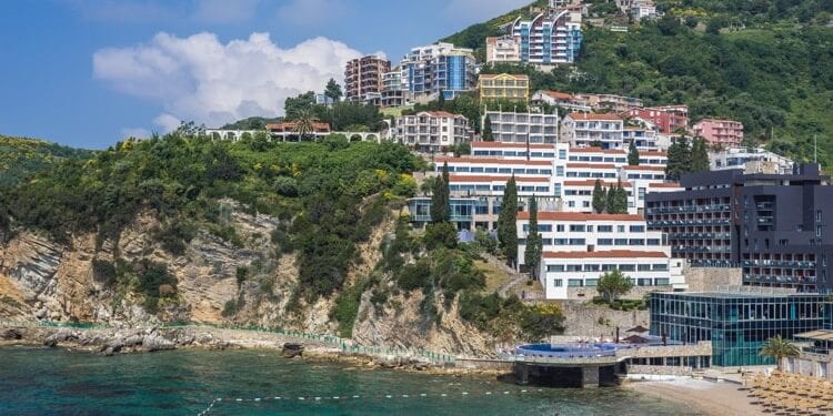 Beach of Avala Hotel near the Old Town of Budva city on the Adriatic Sea coast in Montenegro.