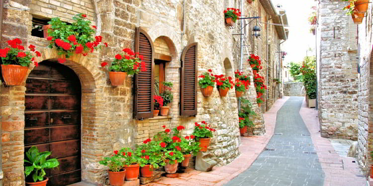 Picturesque lane with flowers in an Italian hill town