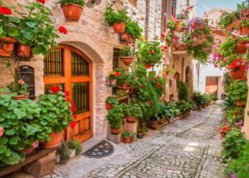 Street in small town in Umbria Italy in summer. economy in italy