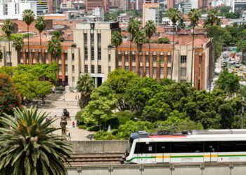 Metro system in Medellin, Colombia with buildings in the background