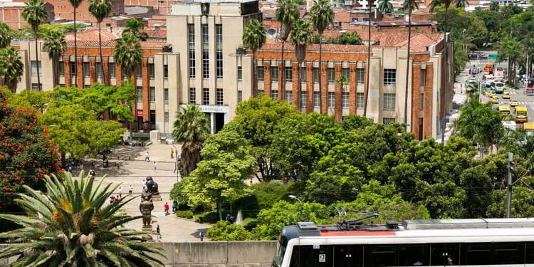 Metro system in Medellin, Colombia with buildings in the background