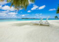 beach chairs on a tropical beach. taxes in panama