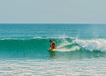 Man surfing in Playa Venao, Panama