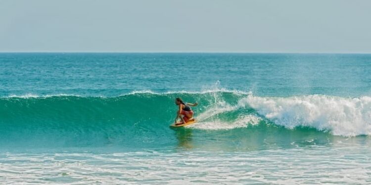 Man surfing in Playa Venao, Panama