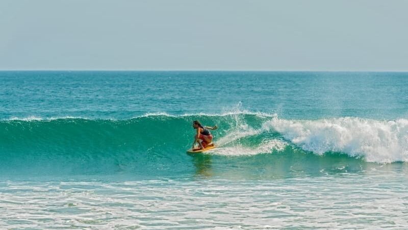 Man surfing in Playa Venao, Panama