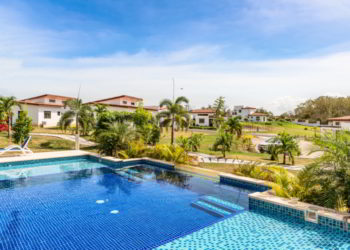 Swimming pool and the houses in the expat’s community project near Las Tablas in Panama.