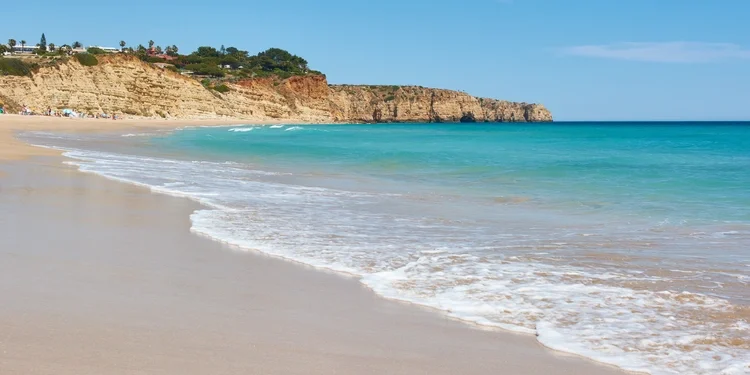 Praia do Porto de Mos, Lagos. Typical Algarvian beach with turquoise water and white sand