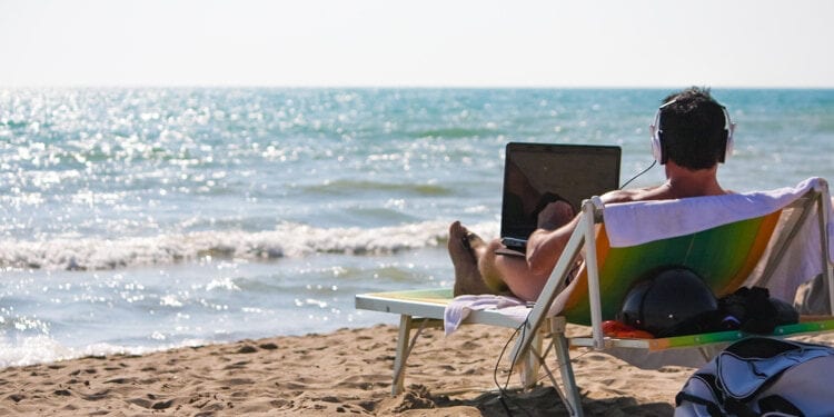 Man at work from the beach