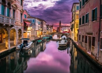 Beautiful canal in Venice, Italy at dusk