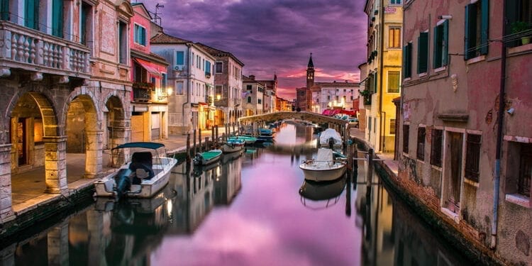 Beautiful canal in Venice, Italy at dusk