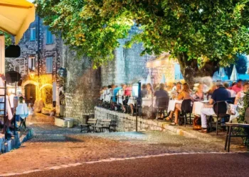 French street cafe at night. A Successful Move To Europe