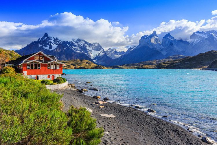 A red house in Torres Del Paine National Park, Chile. Pehoe lake is to the right.