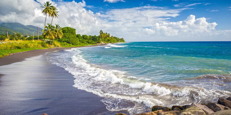 Beach on a St. Kitts island with black sand