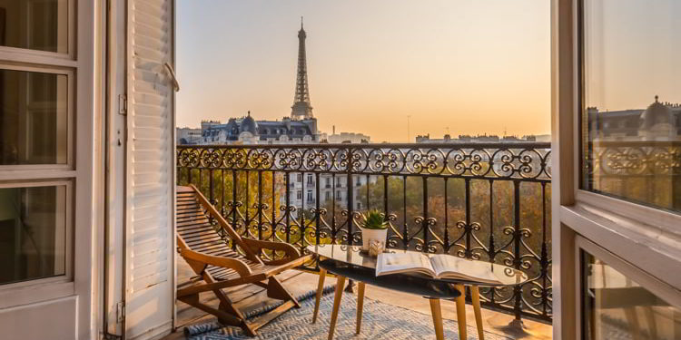 Beautiful Paris balcony at sunset with Eiffel Tower view