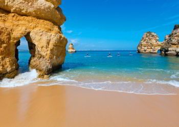 roup of rock formations in beautiful beach on a sunny day in Portugal