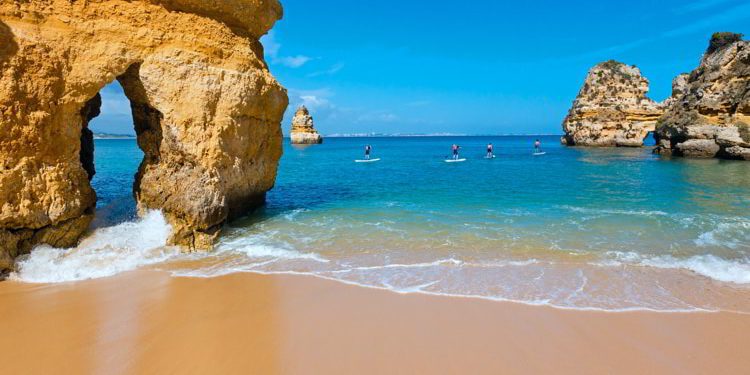 roup of rock formations in beautiful beach on a sunny day in Portugal