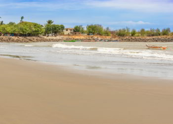 Small fisherman boats at the bay and the houses in El Rompio village near town of Chitre in Panama