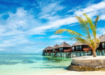 Exotic wooden huts on the water, Maldives