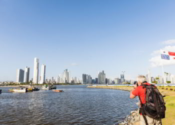 Senior man photographing a Panorama of Panama City.