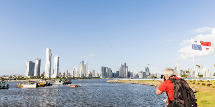 Senior man photographing a Panorama of Panama City.