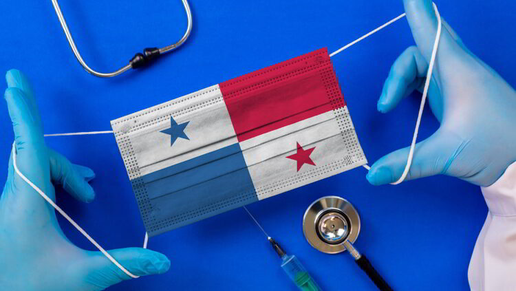 Medical mask with the flag of Panama in the hands of a doctor and stethoscope. health care in panama