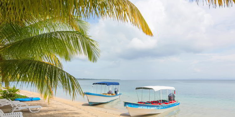 Boats at the Starfish beach, archipelago Panama Bocas del Toro