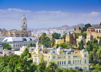 Malaga Spain Cityscape On The Sea. travel europe on a budget