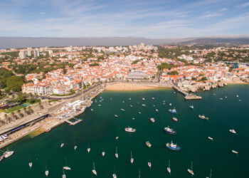 Yacht near beautiful beach and marina of Cascais, Portugal