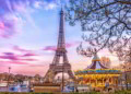 The Eiffel Tower and vintage carousel on a winter evening in Paris, France retire overseas