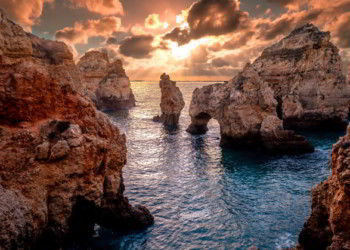 Sunset landscape on Atlantic Ocean, south Portugal best countries to live