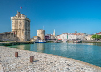 Two medieval towers at La Rochelle harbor in France