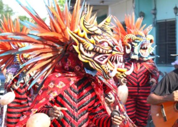 Diablicos dancing in the street in a Corpus Christi celebration. Panama