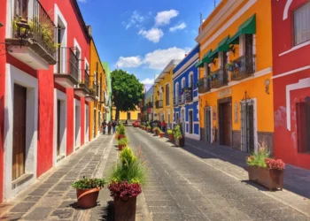 Orange buildings in a colonial street in Puebla City, Mexico