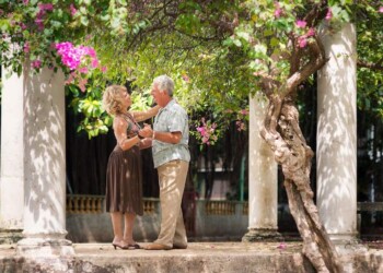 Happy senior couple dancing for fun