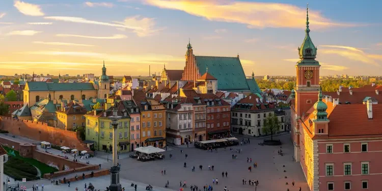 Warsaw, Royal castle and old town at sunset. second passport