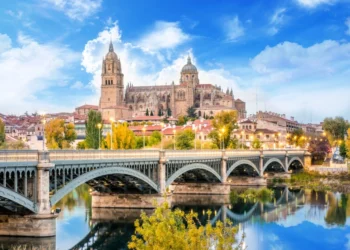 Cathedral of Salamanca and bridge over Tormes river. Spain