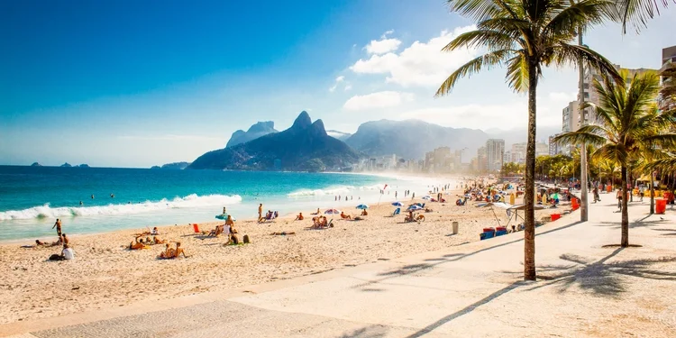 Palms and Two Brothers Mountain on Ipanema beach, Rio de Janeiro. retire in latin america