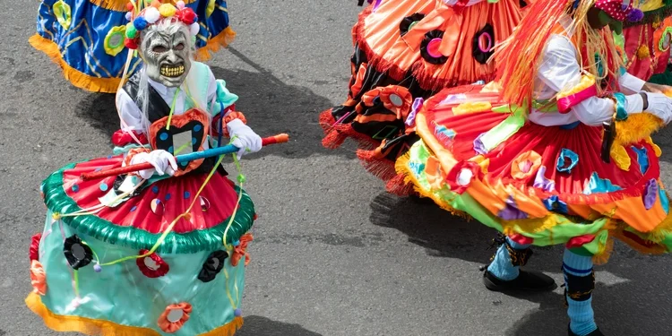 Person wearing costume during Panama National Day parade celebrating the separation of Panama from Colombia. fiestas patrias