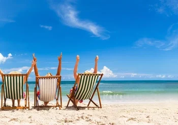 Cheerful Friends In A Beach