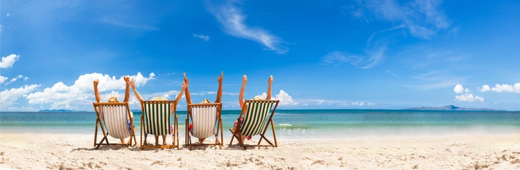 Cheerful Friends In A Beach