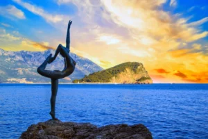 Beautiful view of the sculpture Ballerina Dancer of Budva at sunset, Budva, Montenegro