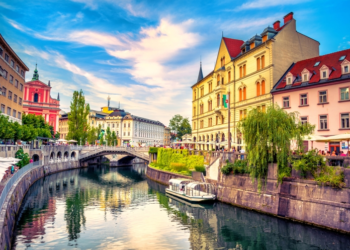 Cityscape view on Ljubljanica river canal in Ljubljana old town. Ljubljana is the capital of Slovenia and famous european tourist destination. retire in europe