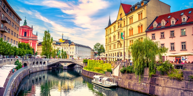 Cityscape view on Ljubljanica river canal in Ljubljana old town. Ljubljana is the capital of Slovenia and famous european tourist destination. retire in europe