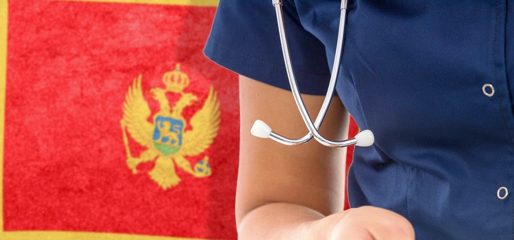 The Montenegro flag as background to a female doctor. health care in montenegro