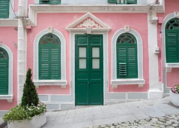 The traditional quaint houses in pink Portugal style and vintage