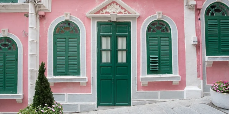 The traditional quaint houses in pink Portugal style and vintage