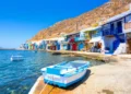 Scenic Klima village (traditional Greek village by the sea, the Cycladic-style) with sirmata - traditional fishermen's houses, Milos island, Cyclades, Greece.