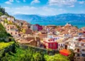 Nafplio, Greece aerial view and snow mountains.